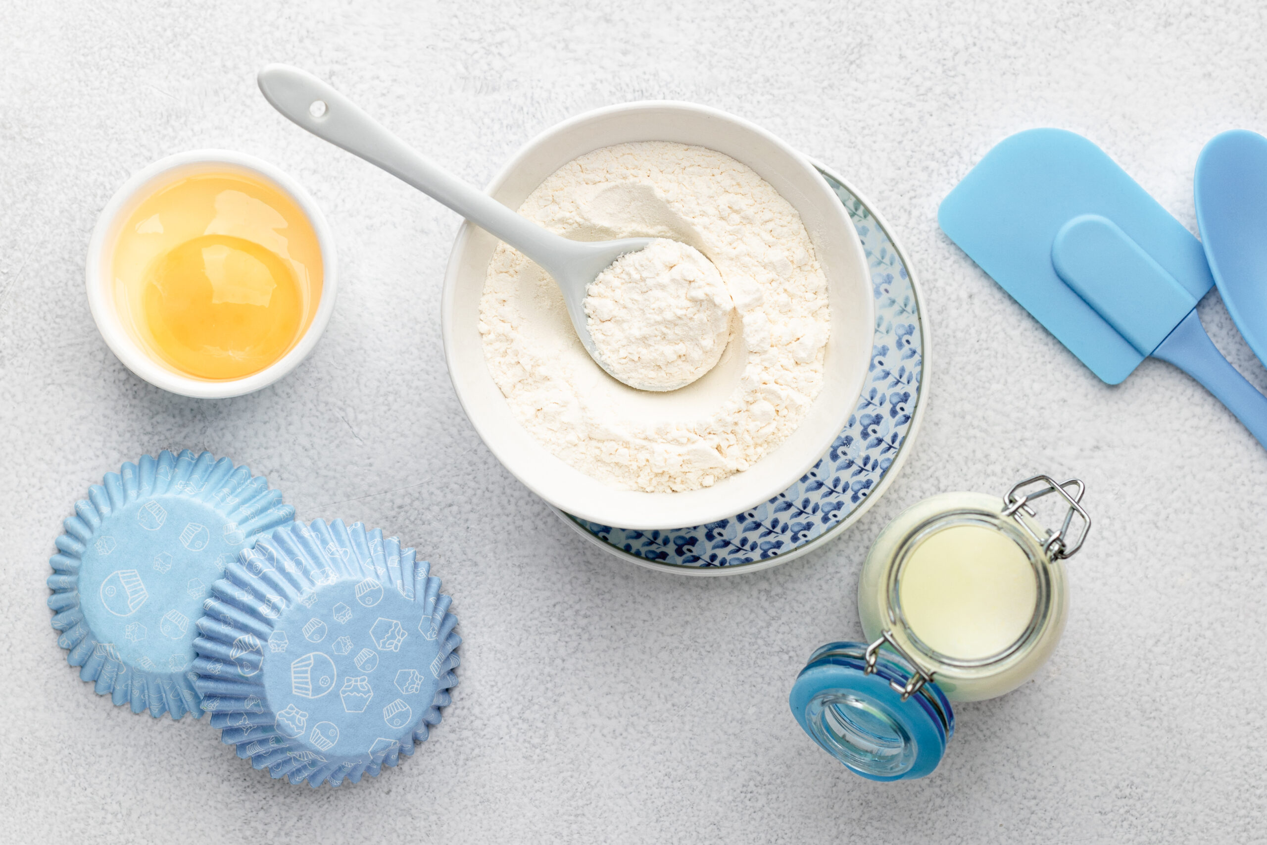 Food ingredients for baking on a white background. Cooking is flat with a copy space. View from above. The concept of baking. layout.