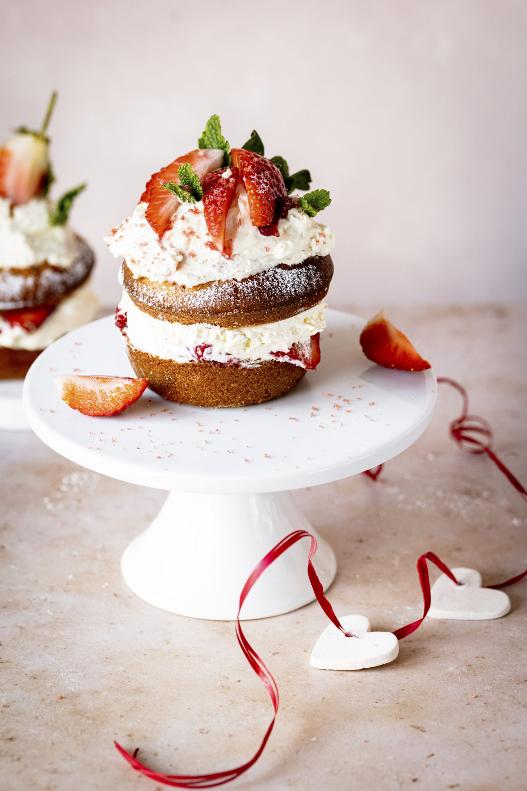 Cute mini strawberry shortcakes on a stand